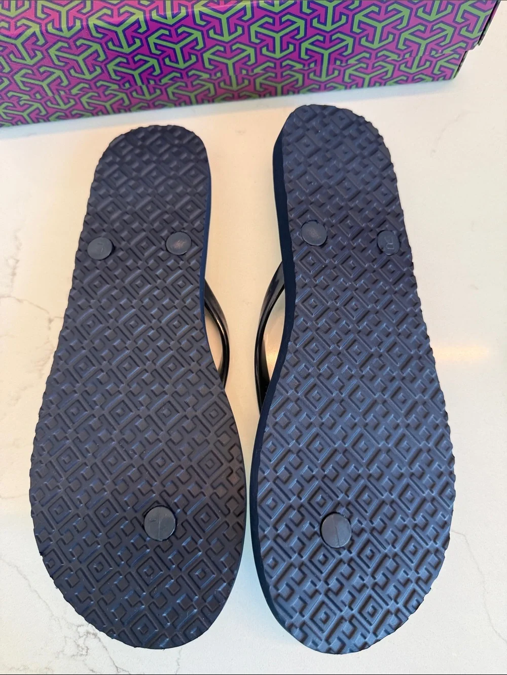 Tory Burch Floral Flip-Flop Sandals in Navy and Cream with Gold Logo